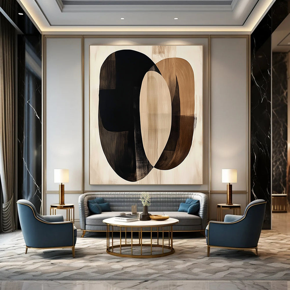 Large abstract artwork featuring fluid beige and black shapes with dark brown ovals on a cream background evokes tranquility through minimalist design.STSC470
