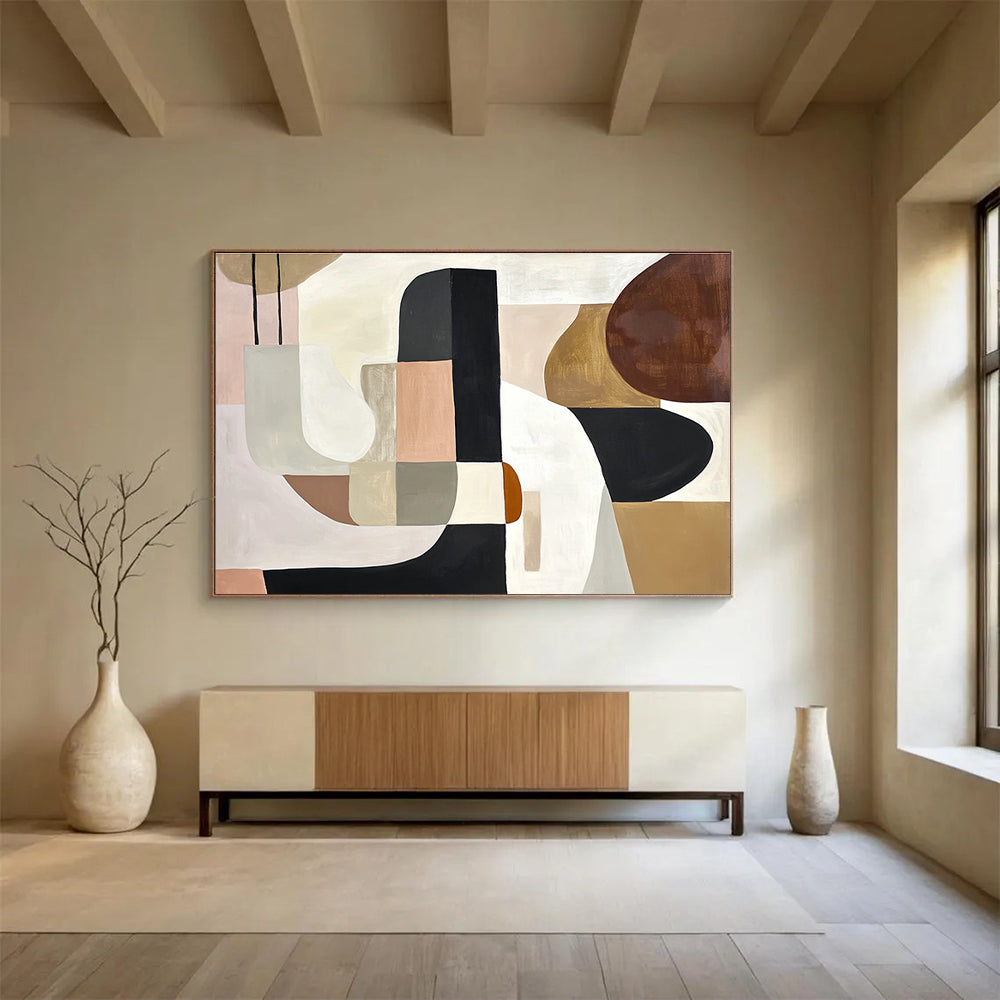 An abstract painting featuring elegant shapes in white, black, and brown, accented with soft beige, pink, grey, and cream tones and brown wood elements.SC352