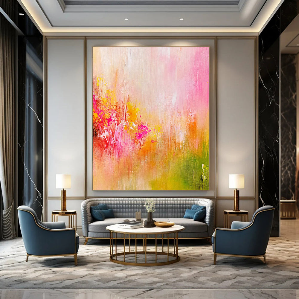 Large abstract painting in soft pink and yellow tones with delicate brushstrokes and a vibrant background evoking a romantic dreamy atmosphere.STSC489