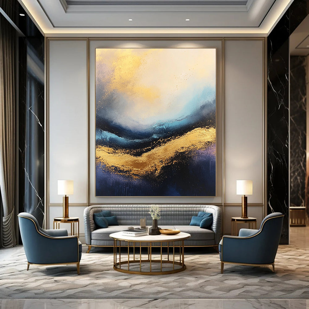 Large abstract painting of stormy seas featuring rich gold and blue tones with a captivating textured surface.STSC333