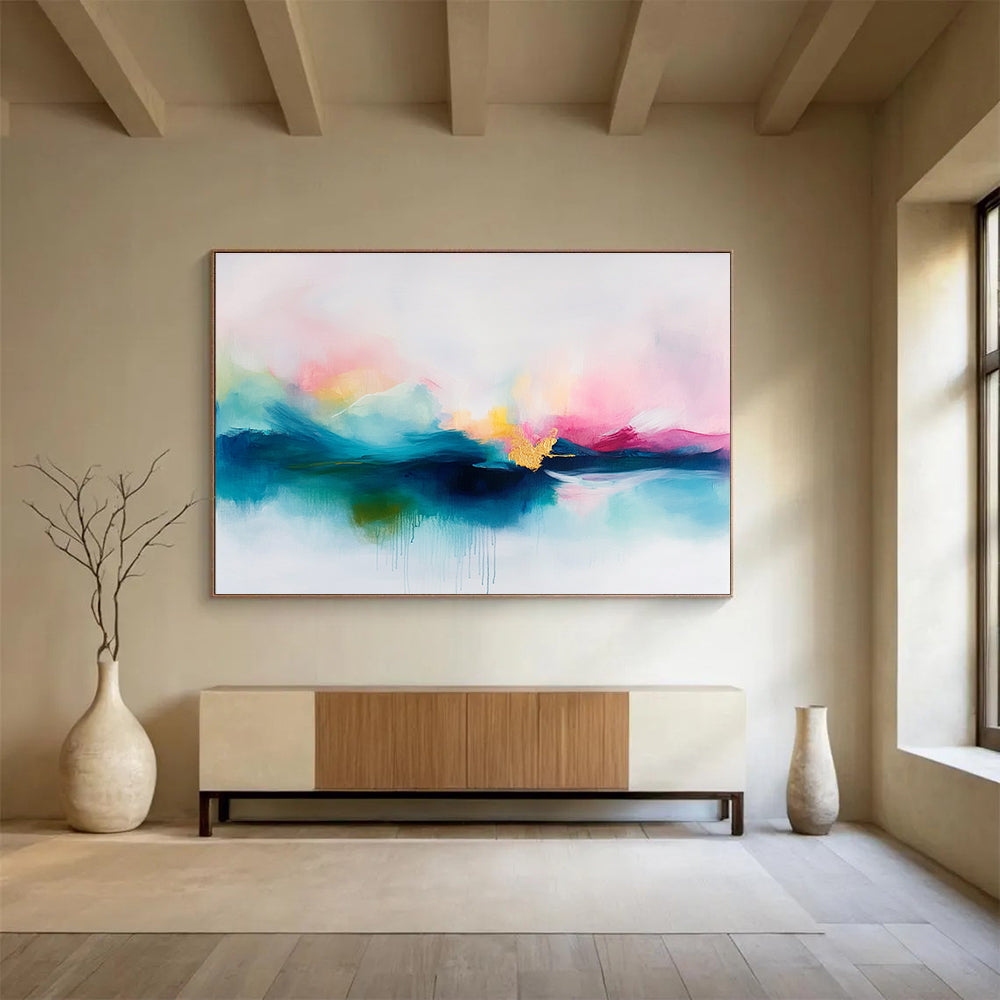 A large abstract painting featuring soft pastel colors in pinks and blues with delicate gold accents on a serene white background.SC383
