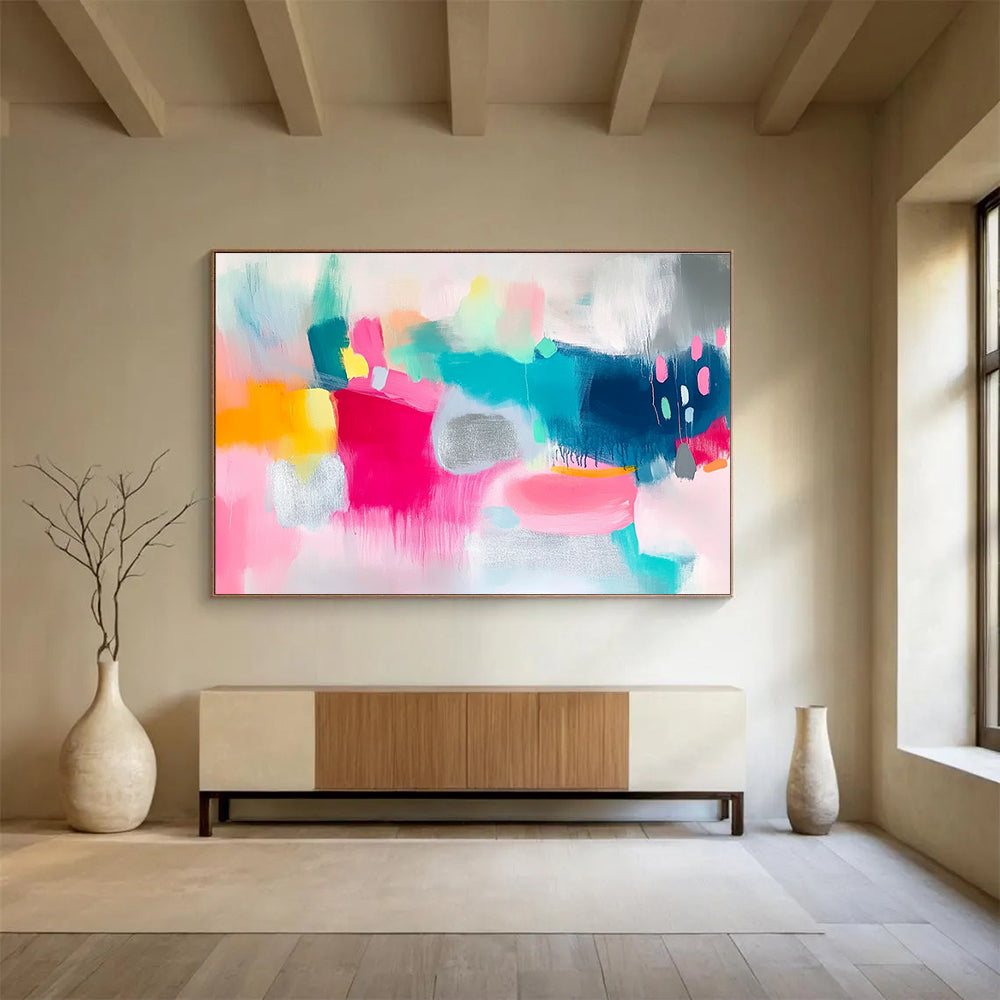 Large abstract painting featuring vibrant pink and teal shapes on a white background with bold brush strokes and shimmering silver foil accents.SC215
