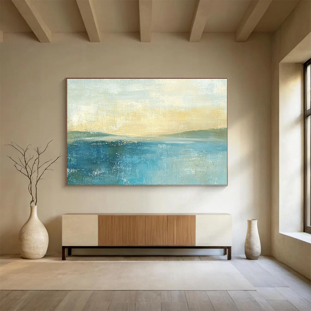 Abstract painting featuring soft colors in muted blues and greens with a pale yellow sky gentle horizon and serene sea.SC085