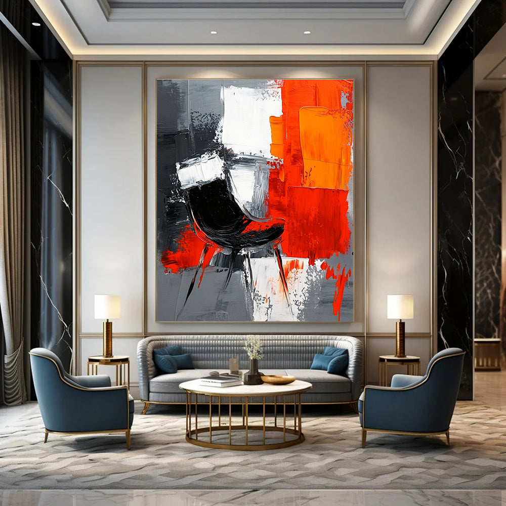 Large abstract painting with gray background featuring white and orange shapes and a contrasting black chair created with oil paint on textured paper.STSC226
