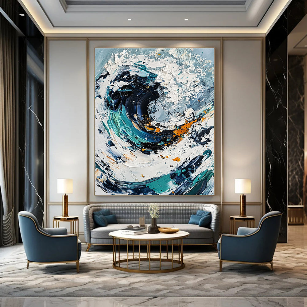Large abstract painting of an ocean wave in white and blue tones with black center and colorful details created using a palette knife on canvas.STSC263