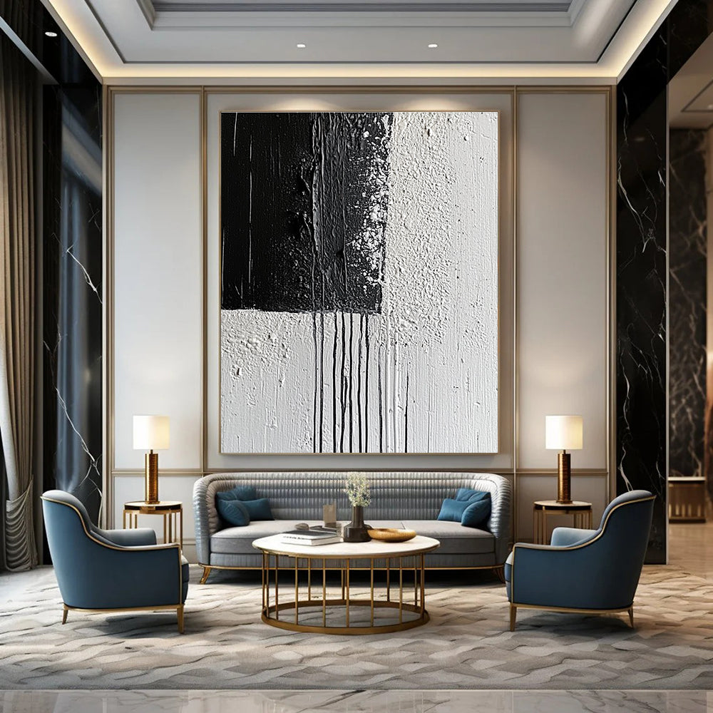 Large abstract painting with broad strokes and delicate paint drips on a textured canvas featuring a monochromatic gray color scheme.STSC539