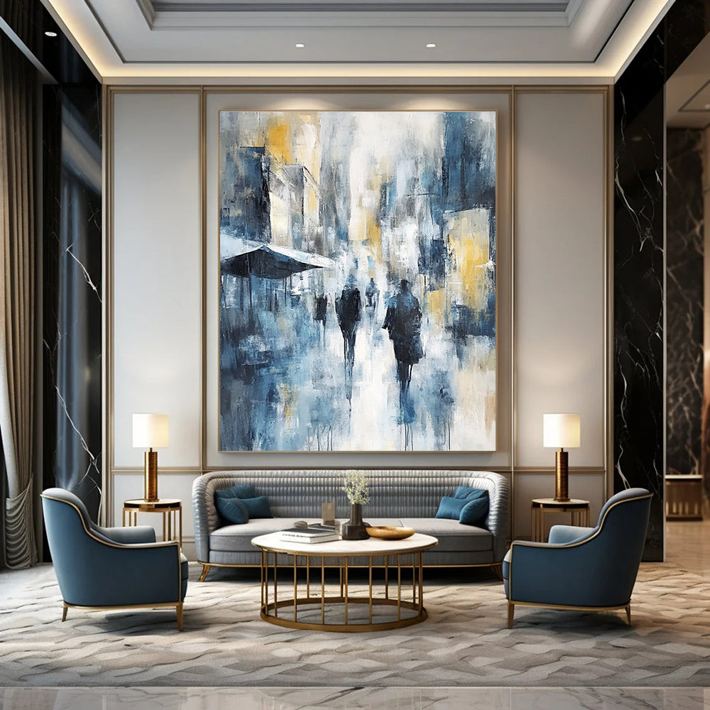 Large abstract painting of an urban cityscape in cool blue tones with hints of yellow and gray showcasing soft brushstrokes and impressionist influence.STSC277