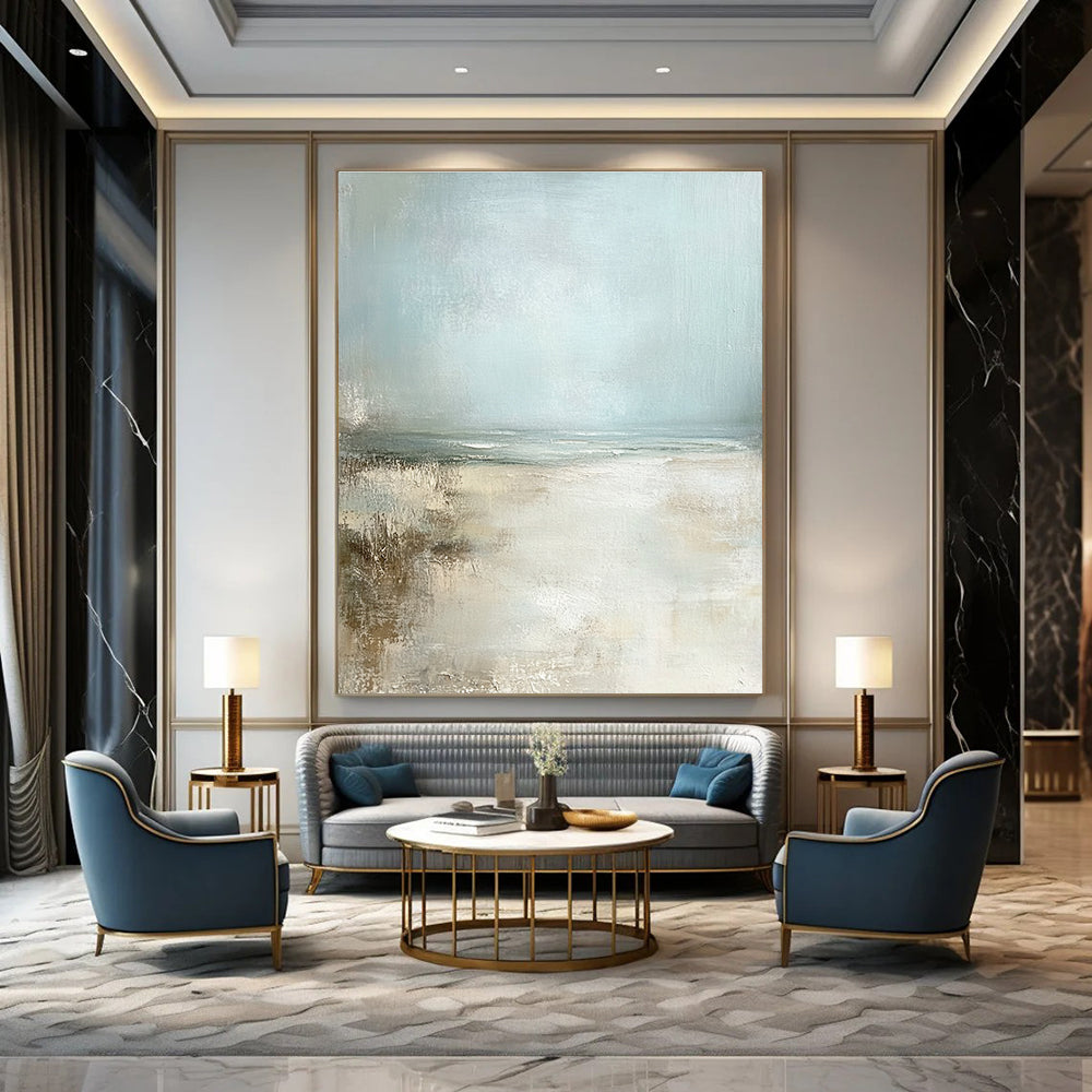 Large abstract painting featuring a serene pale blue sky and sandy beach in neutral colors for a calming ambiance.STSC095