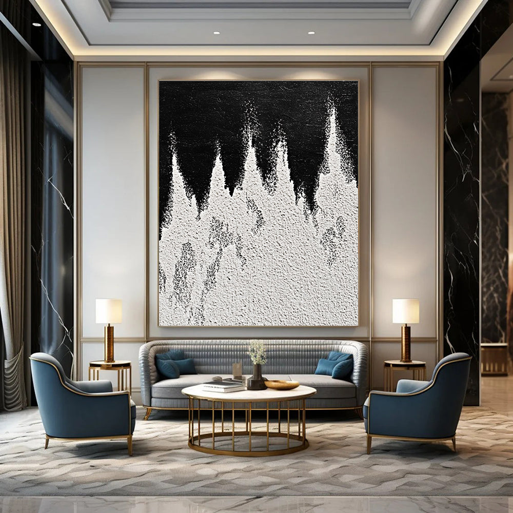 A large abstract painting featuring white powder on a black background with textured mountain ranges in playful gray and white tones capturing sharp edges.STSC1487