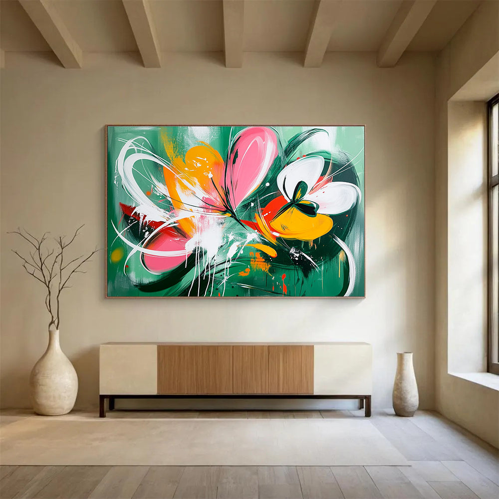 Large abstract painting of wildflowers with dynamic splashes and shapes in green pink yellow and orange accented by white lines and butterflies.SC207