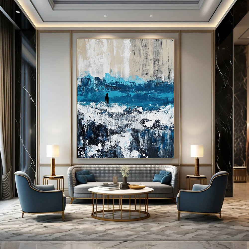 Large abstract painting of an ocean with waves in blue and gray featuring white caps for a serene coastal ambiance.STSC266