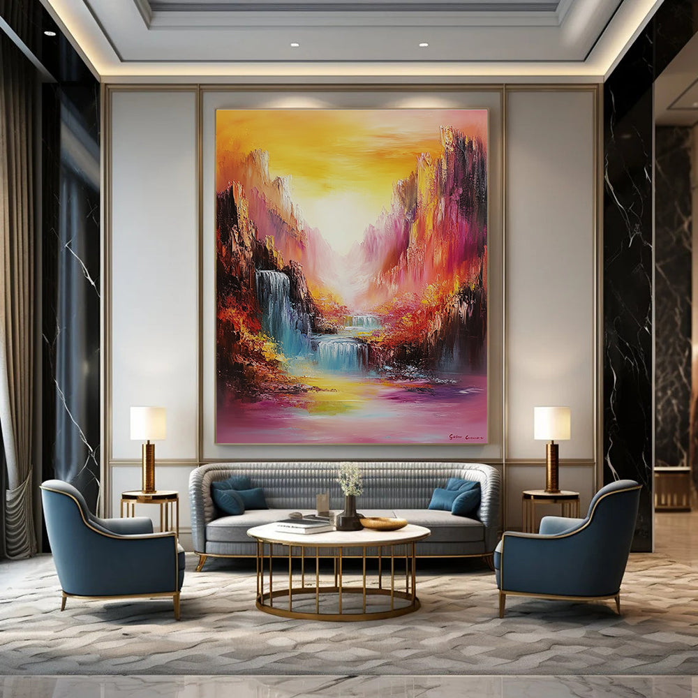 Large abstract oil painting featuring vibrant mountains and waterfalls in rainbow colors with bold brush strokes and a dreamy golden hour landscape.STSC1374