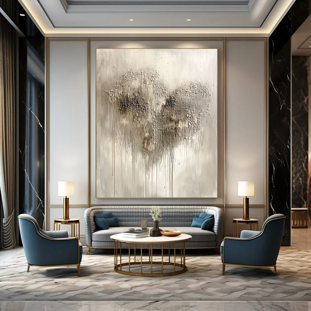 Large abstract painting in silvery gray with impasto texture featuring a heart-shaped pattern and accents of black and dark brown.STSC519