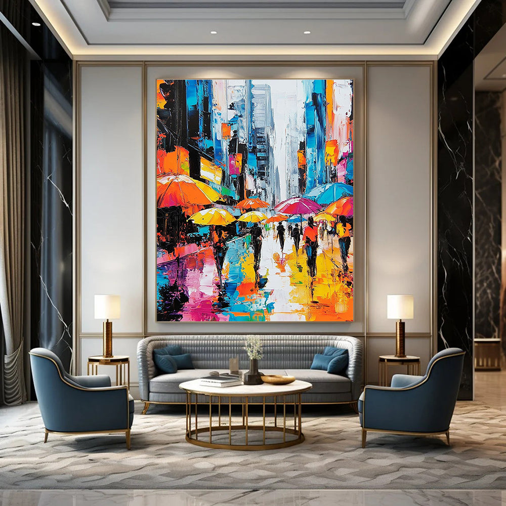 A large abstract painting depicting vibrant city streets with people under colorful umbrellas and towering skyscrapers highlighting urban energy and movement.STSC872