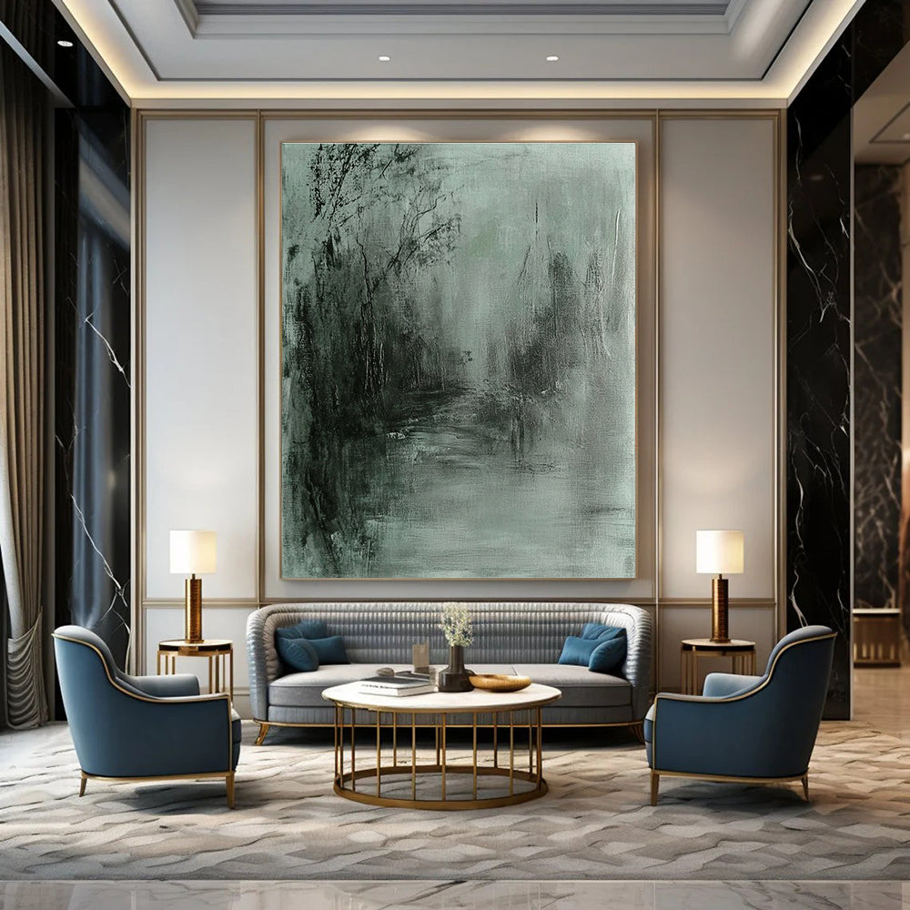 Large abstract painting in gray and green tones featuring soft edges and a dark background evokes tranquility and mystery through fluid brushstrokes.STSC419