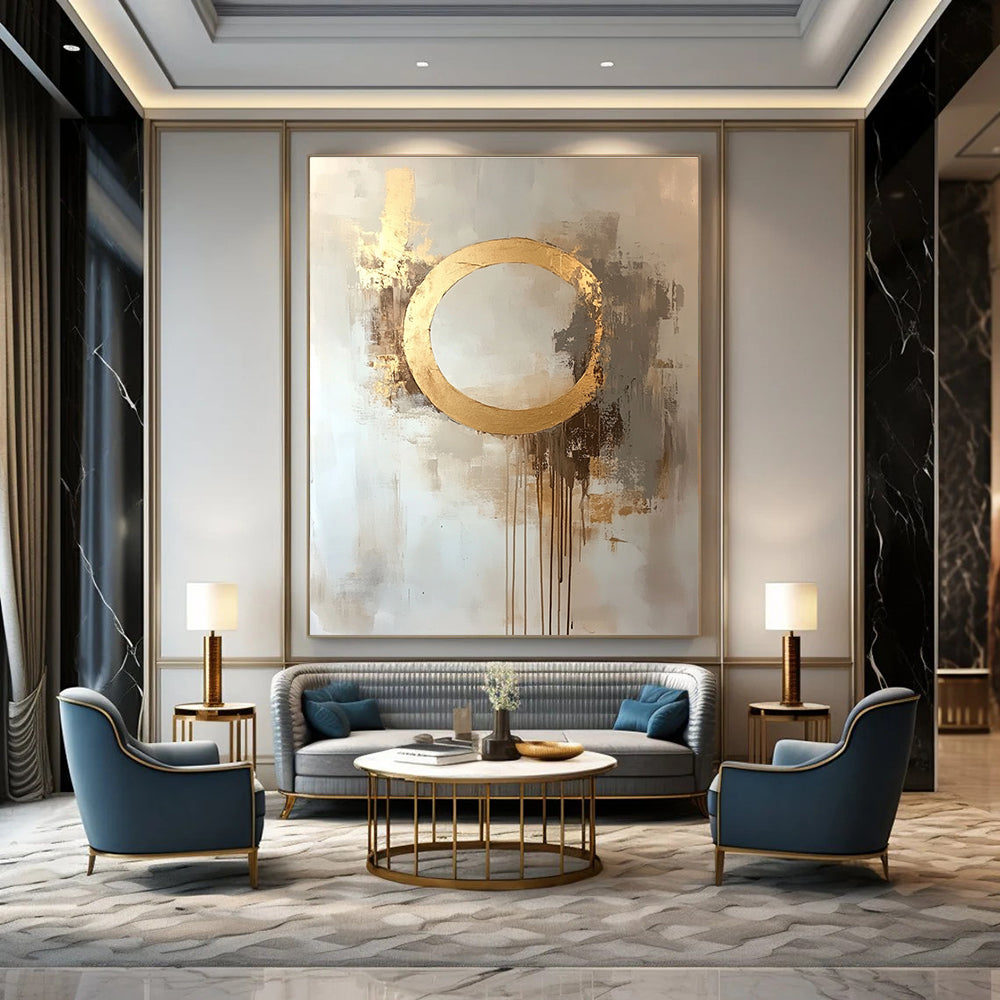 Large abstract oil painting featuring a moon with a golden circle in beige and gold tones with dripping gold leaf on a white background.STSC170