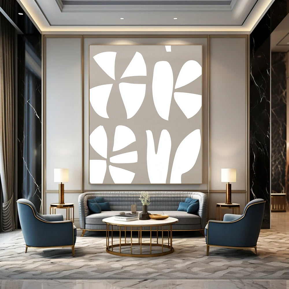 Large abstract painting featuring a white and gray pattern of the number three and two large flowers on a light brown background.STSC1240