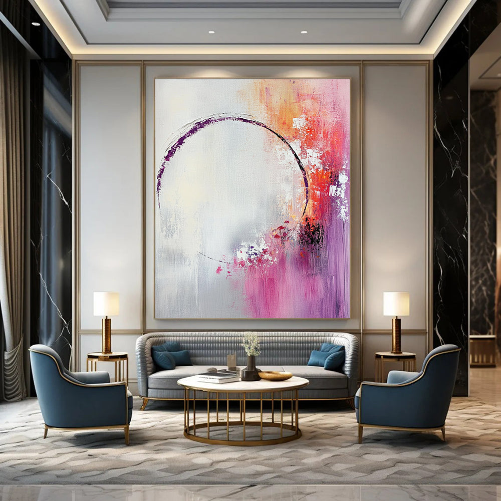 Large abstract painting featuring light pink and white shapes with a soft gray background and tranquil accents of purple and red.STSC429