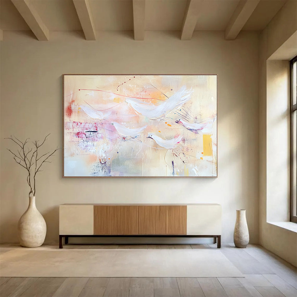 Large abstract painting with soft pastels featuring flying birds and textured layers evoking freedom and movement against a warm beige background.SC385