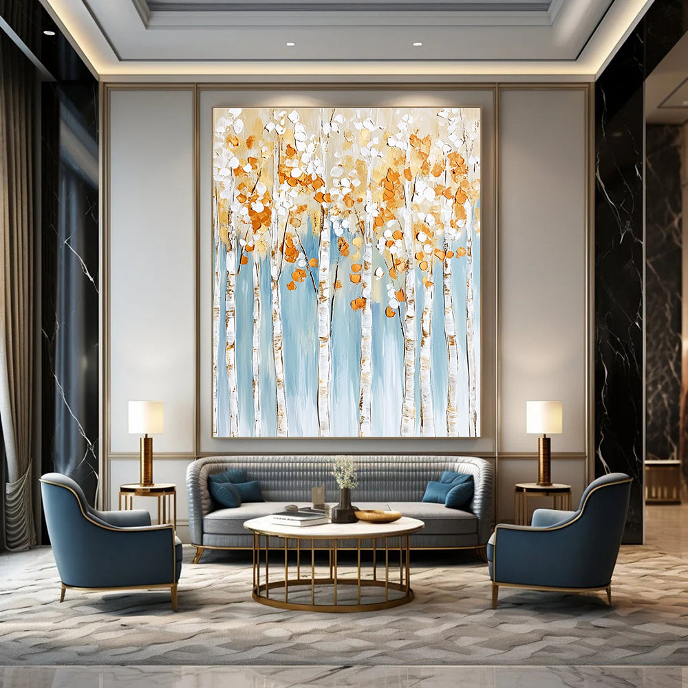 Large abstract painting featuring birch trees with white and gold leaves on a light blue background with textured brushstrokes in neutral tones.STSC302