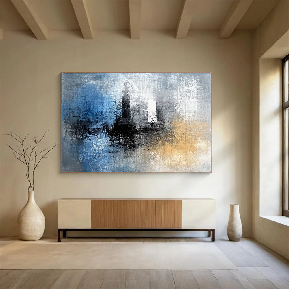 Abstract painting featuring blue black and white textures with gray yellow and brown hues complemented by a tower silhouette in the background.SC032
