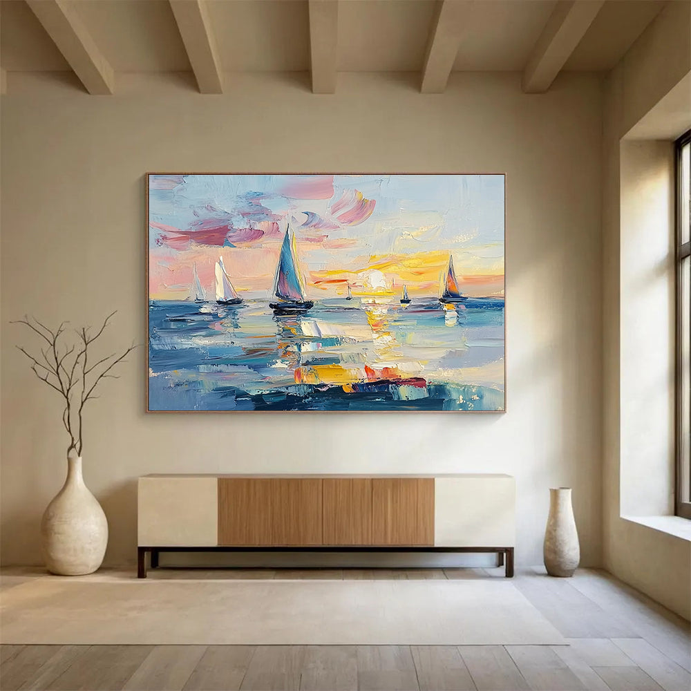 Large abstract painting of the ocean at sunset featuring sailboats vibrant pinks blues and yellows with expressive brush strokes and palette knife textures.SC606