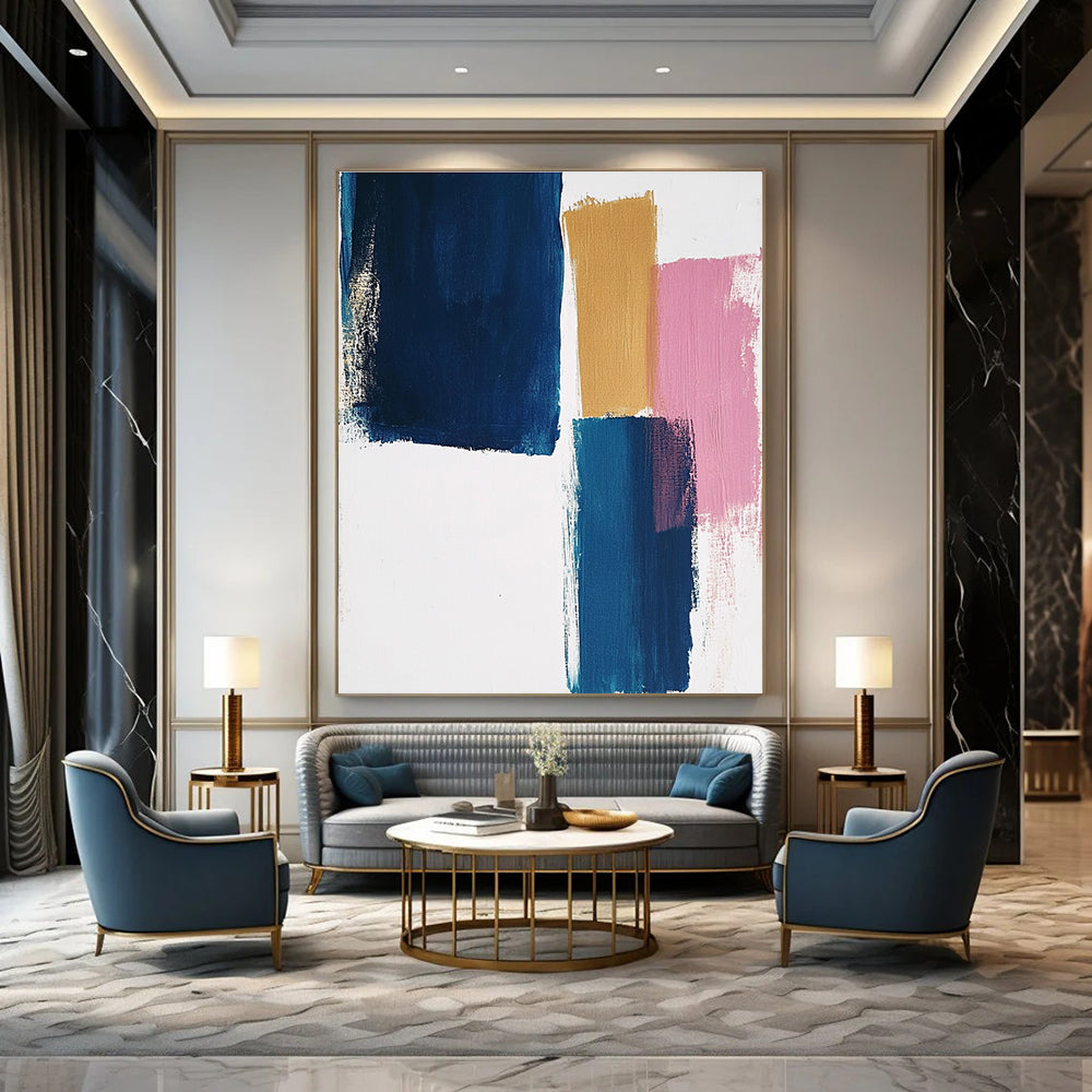 Large abstract painting featuring thick brush strokes on a white background with blocks of blue mustard and pastel pink colors.STSC1343