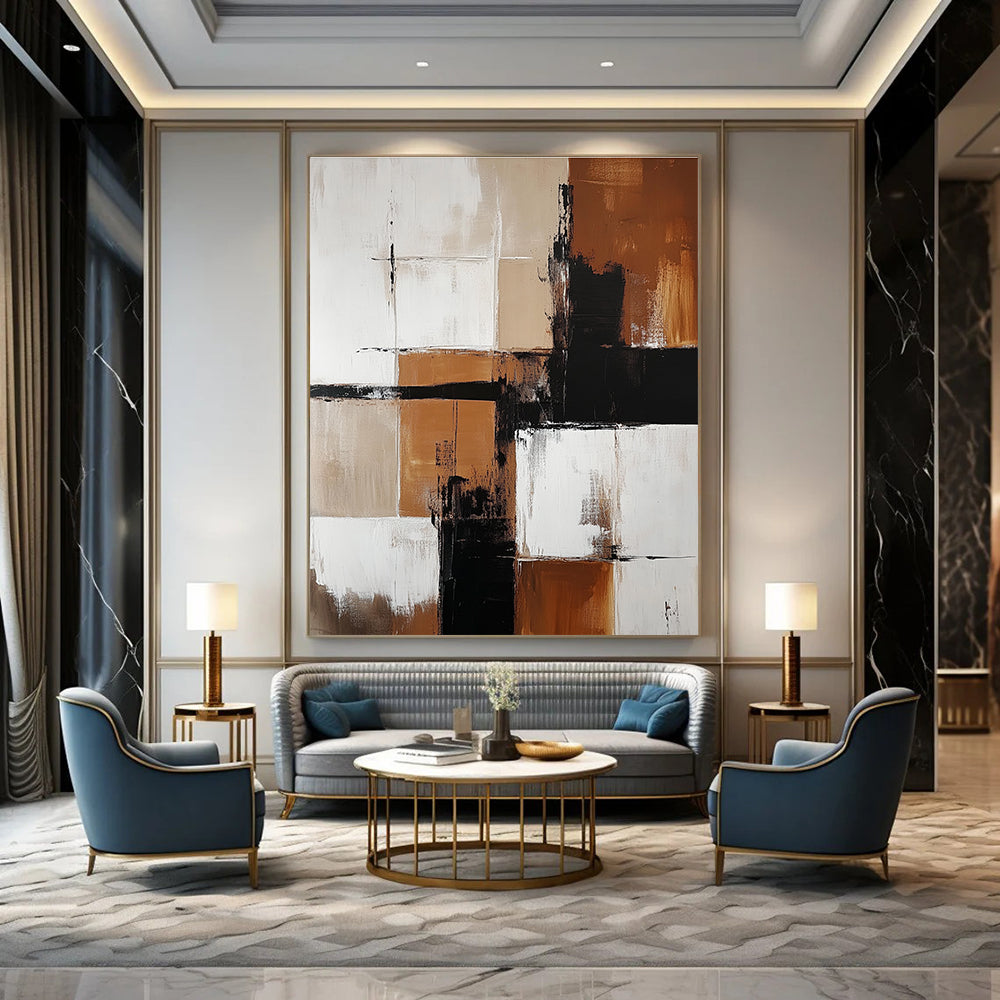 Abstract painting featuring brown and white color blocks with minimalistic black shapes enhancing each section creating a striking visual impact.STSC415