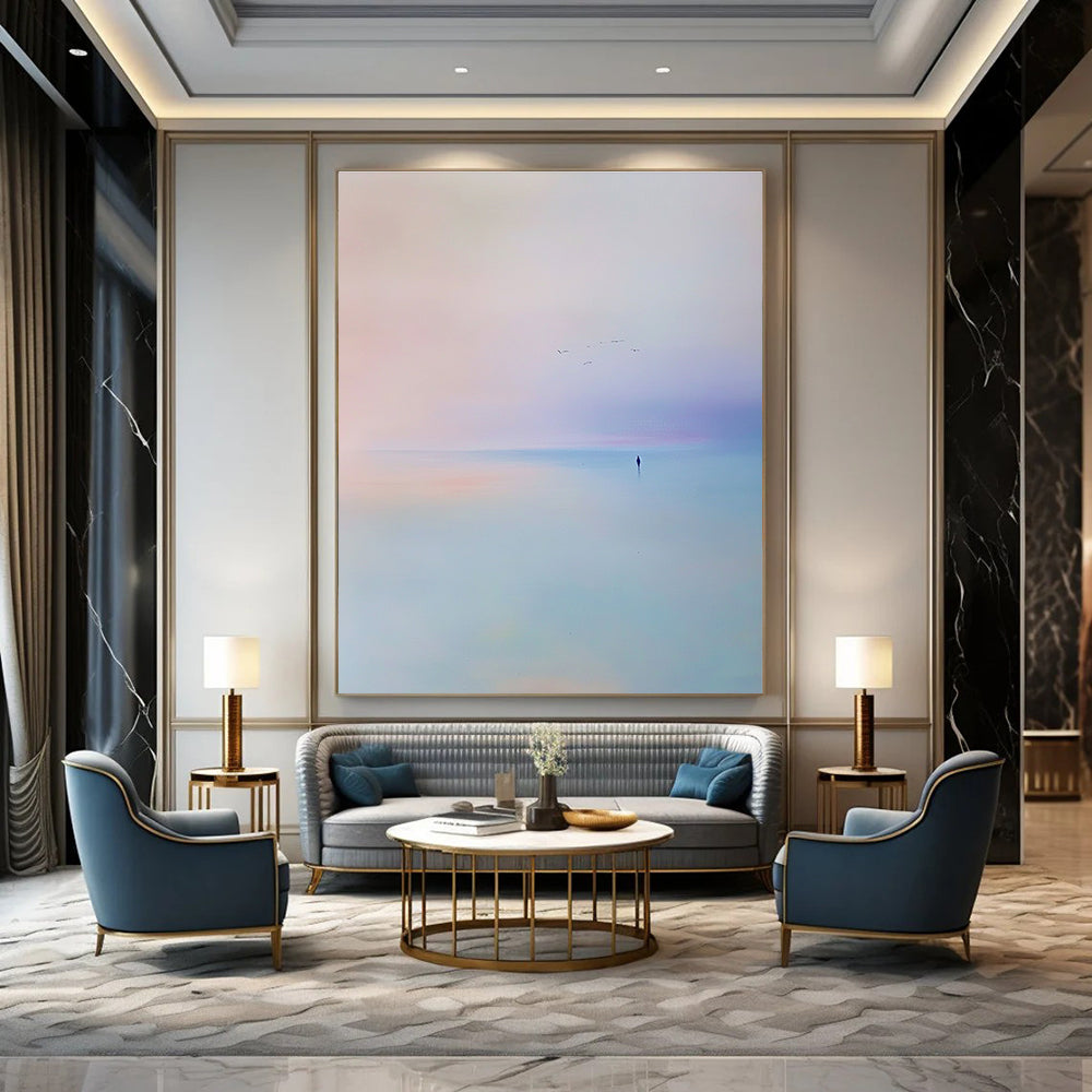 Abstract painting of the sea featuring a light blue and purple sky with soft tones and minimalist style capturing a serene beach scene with flying birds.STSC346