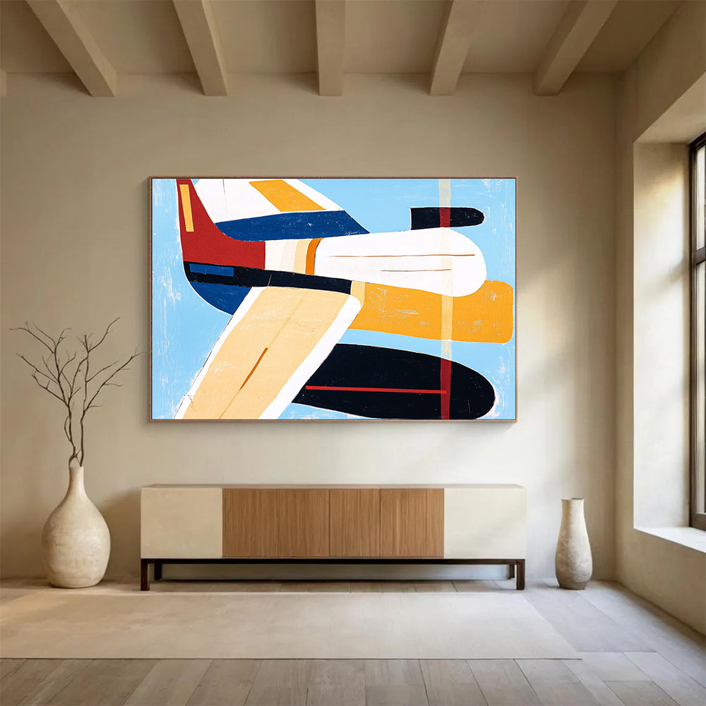 Large abstract painting of an airplane with bold lines and vibrant colors including blue, red, yellow, and orange in the style of Mary Blair.SC040