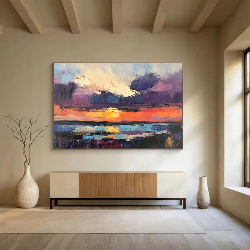 Large abstract painting featuring a sunset over water with bold brush strokes in vibrant purple and blue hues capturing a dramatic sky filled with clouds.SC134