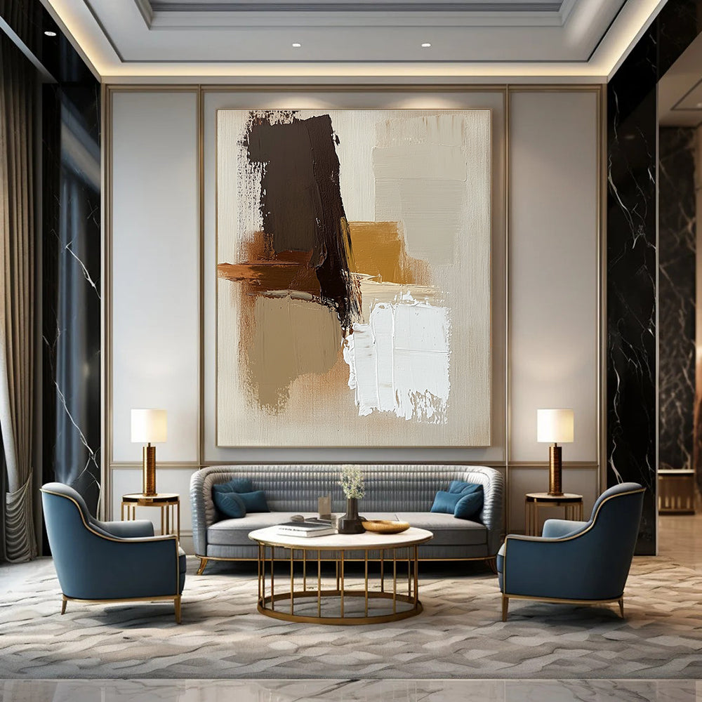 Large abstract painting with brown beige and white colors featuring thick brush strokes and simple shapes on a neutral beige background.STSC747