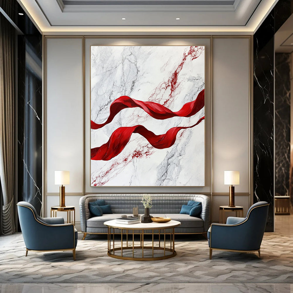 A large abstract painting featuring red flowing ribbons on white marble, evoking movement and elegance in a captivating blend of color and texture.STSC1416