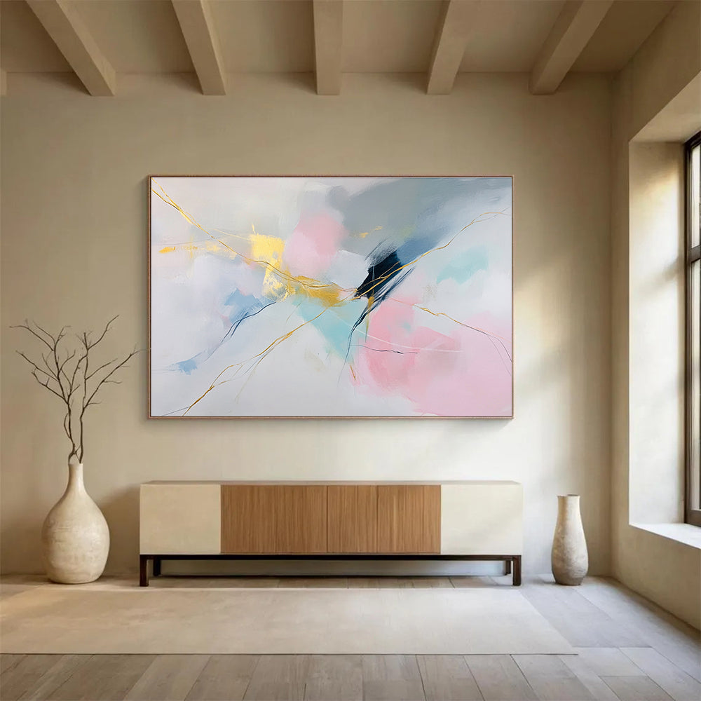 Large abstract painting featuring soft colors on white background with pink blue hues and gold accents delicate strokes create serene shapesSC282