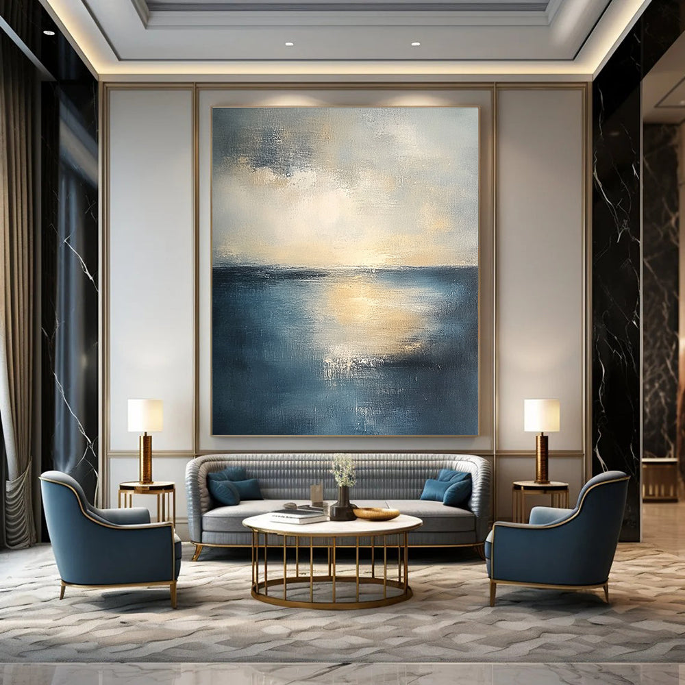 Abstract seascape in muted blue and grey tones with warm yellow sunlight evoking tranquility and reflection on canvas using soft oil paint gradients.STSC461