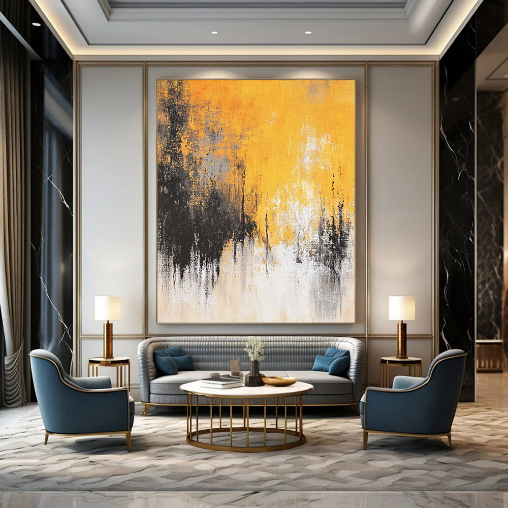 Large abstract painting featuring faded textures and dreamy shades of mustard yellow grey white and black depicting distant trees and a flowing river.STSC728