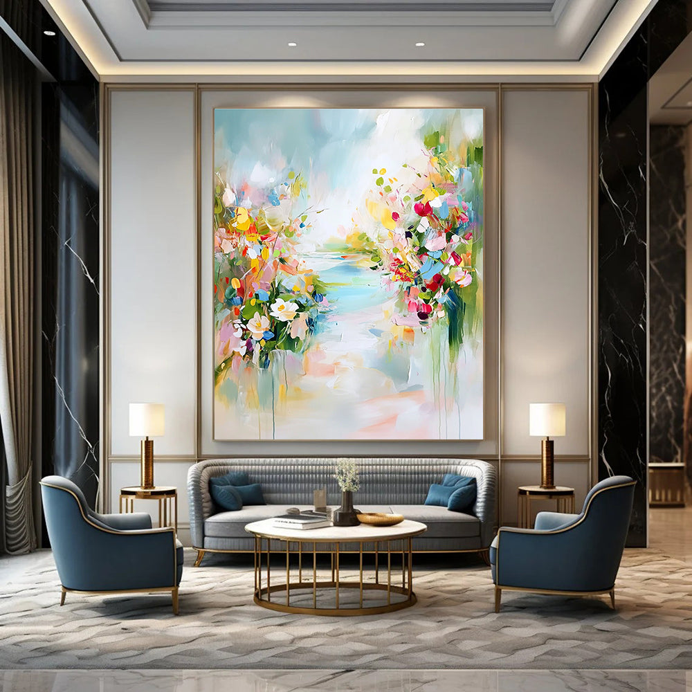 A large abstract painting depicting a tranquil spring landscape with colorful flowers soft skies and hints of blue water.STSC891