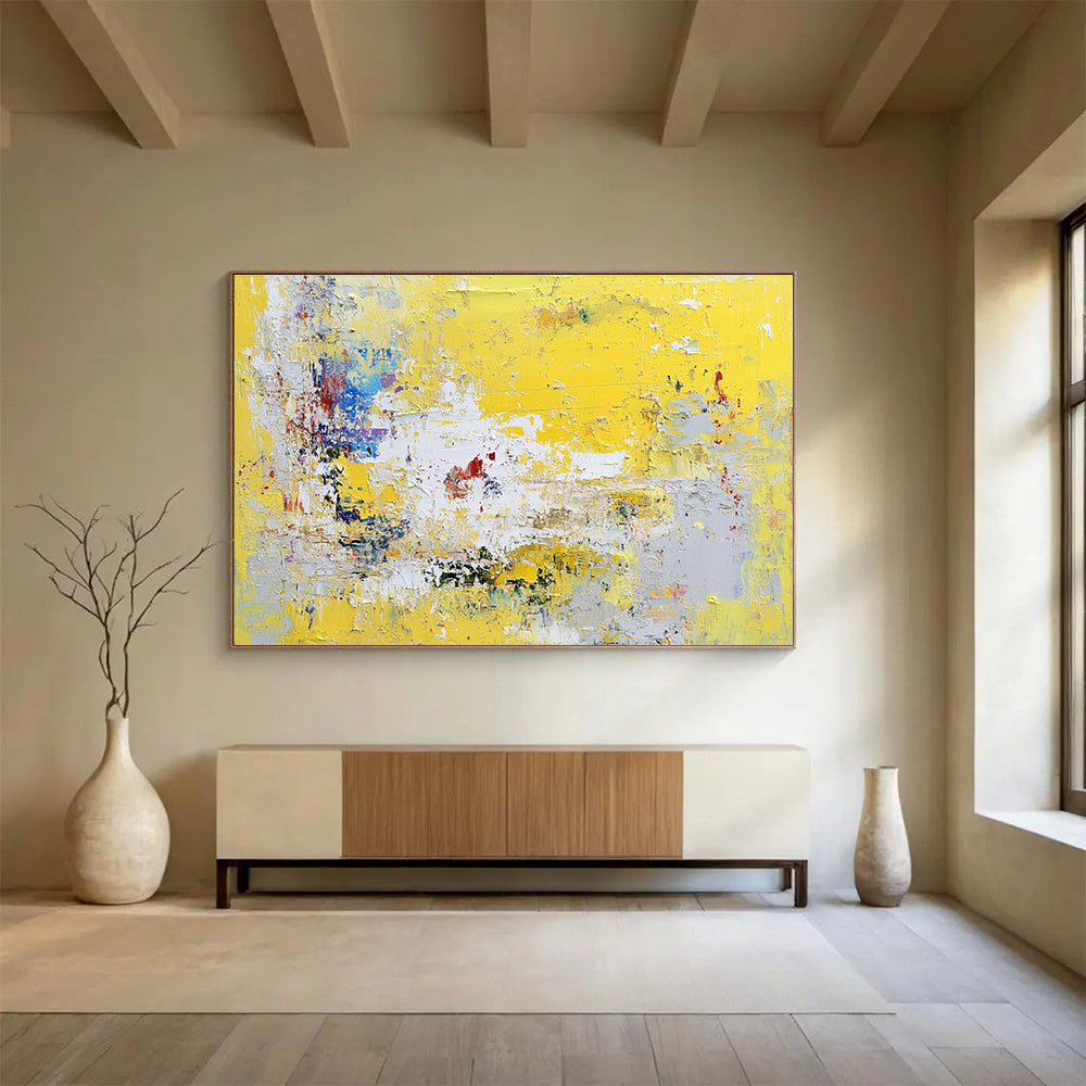 Large abstract painting in yellow and grey with hints of blue green white and red soft textured brushstrokes evoking nostalgia and contemplation.SC370