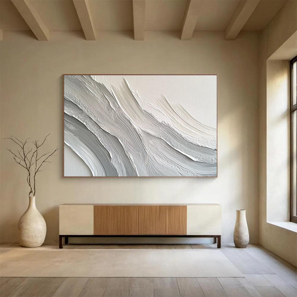 Large abstract painting featuring swirling white and gray patterns that create depth and texture against a plain background.SC451