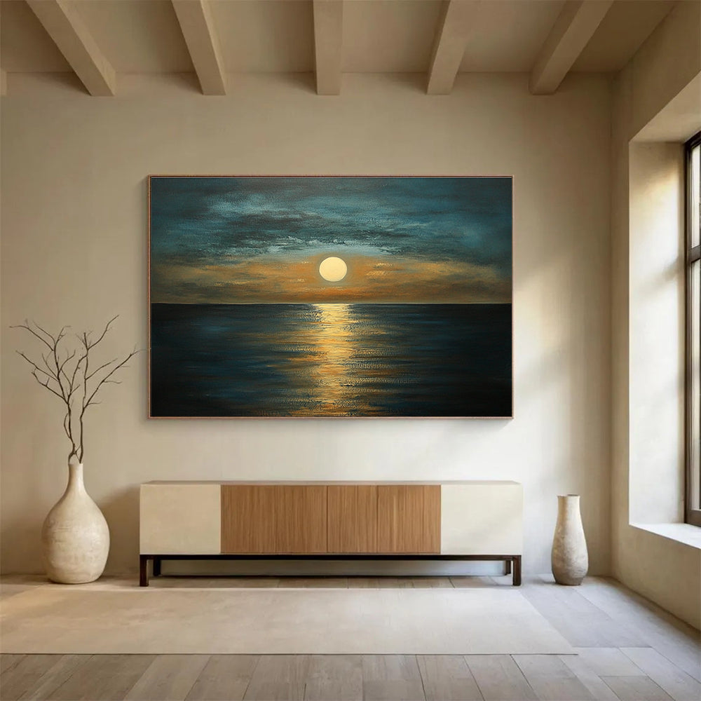 A large abstract painting depicting a serene sea at dusk with muted tones of blue brown and gold capturing tranquility and harmony in nature.SC413