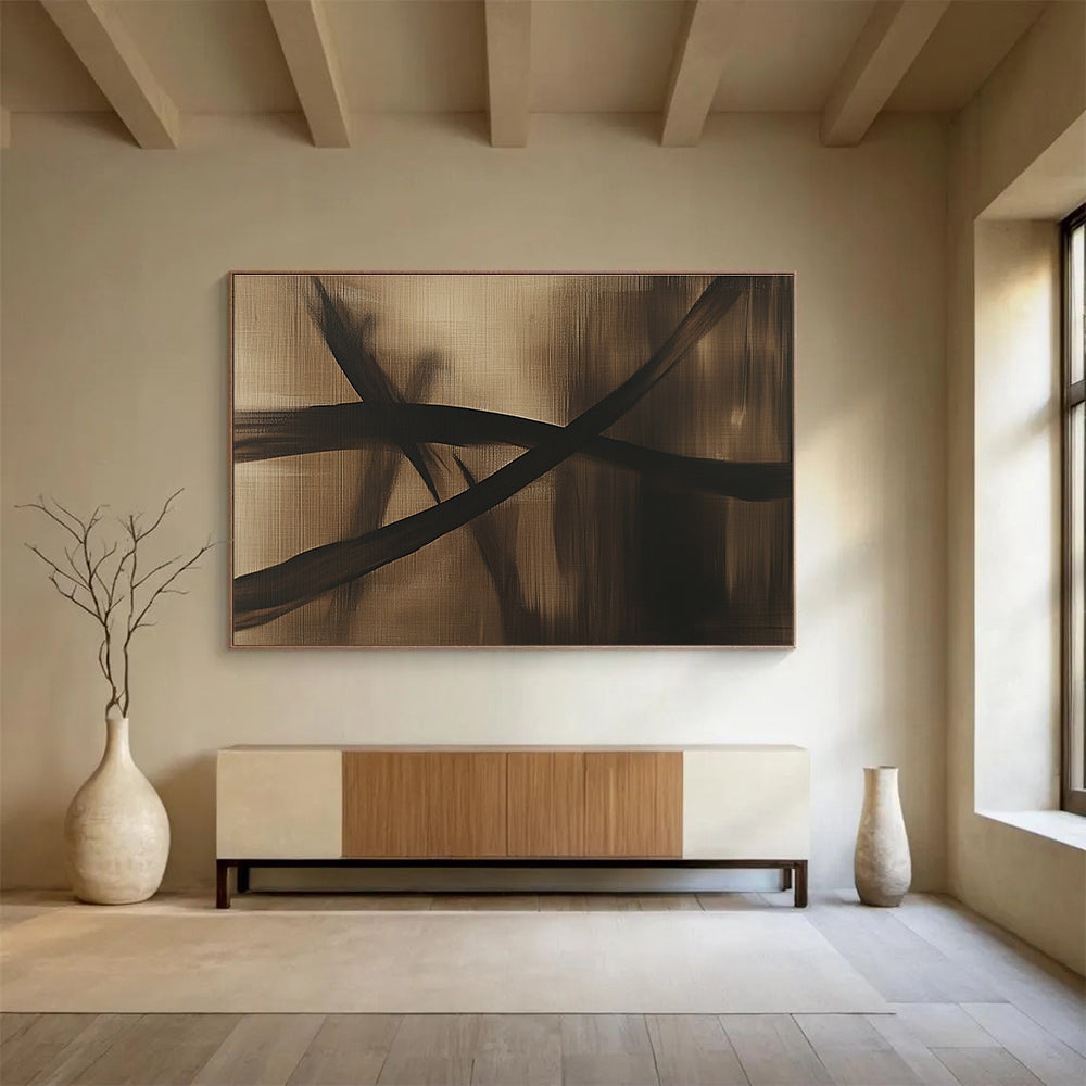 Large abstract painting in brown and black tones featuring a dragonfly silhouette and flowing lines on a dark gray background, exuding mystery and simplicity.SC586