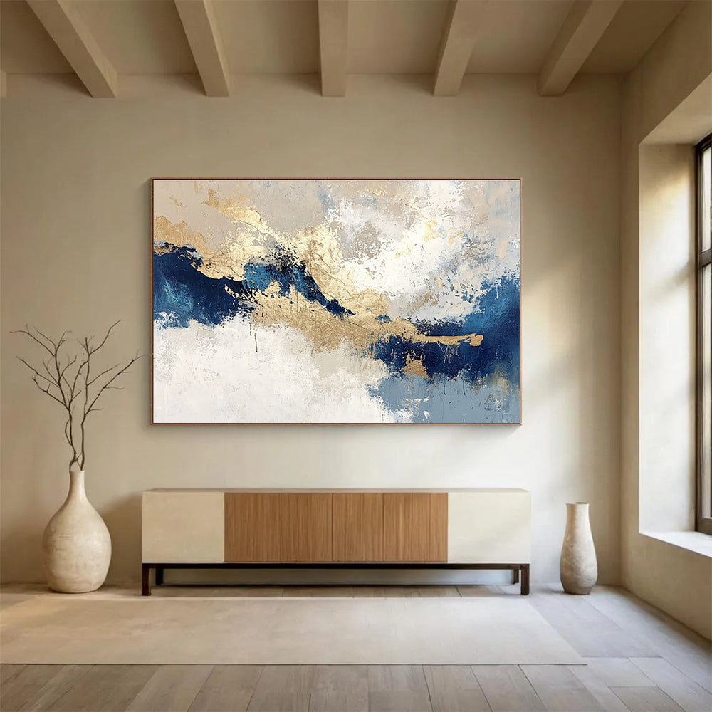 Large abstract painting in blue and gold on textured beige and white background featuring light gray and dark indigo tones for a stunning decor.SC023