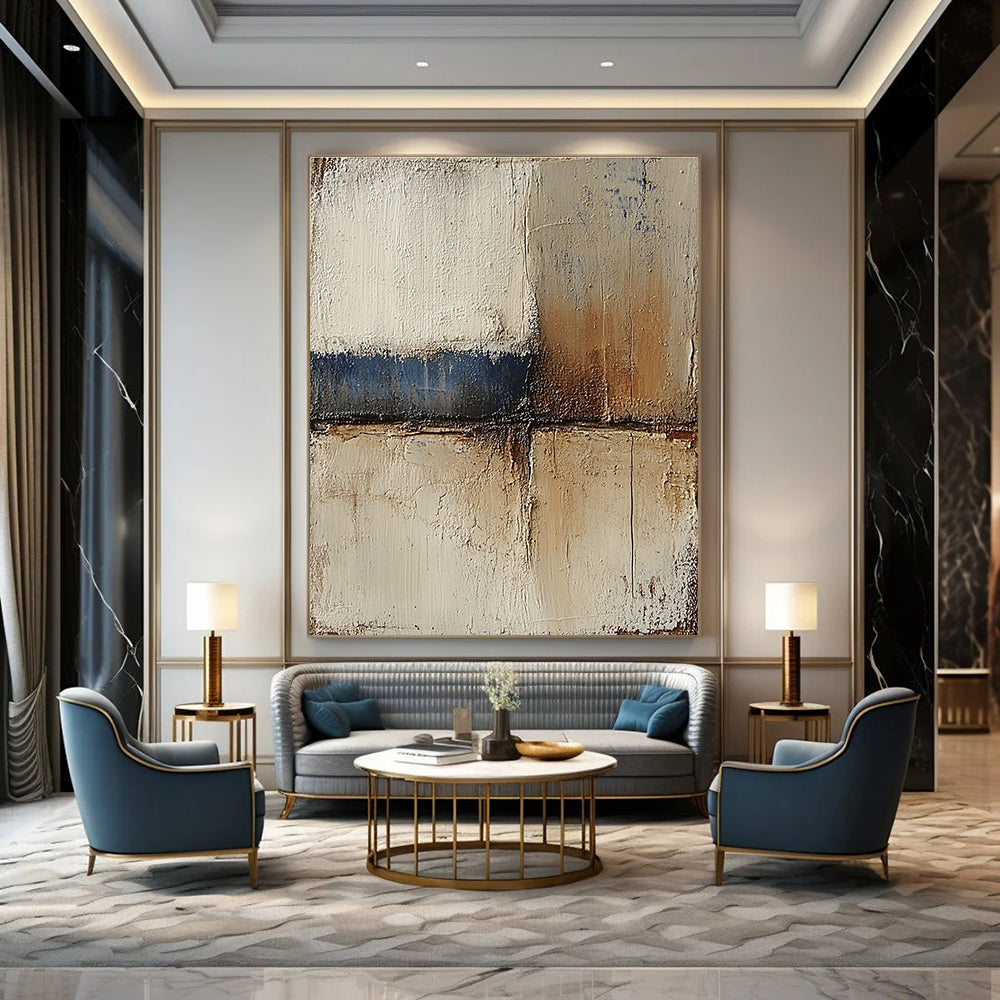 Abstract landscape with neutral colors in earth tones of beige and brown accented by blue textured paint ideal for modern decor.STSC079