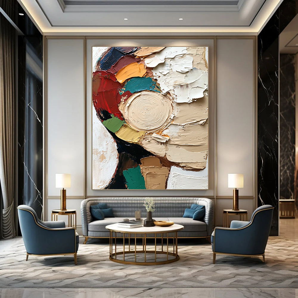 Large abstract painting featuring a textured close-up of a face in vibrant colors and dynamic brush strokes against a white circular patterned background.STSC283