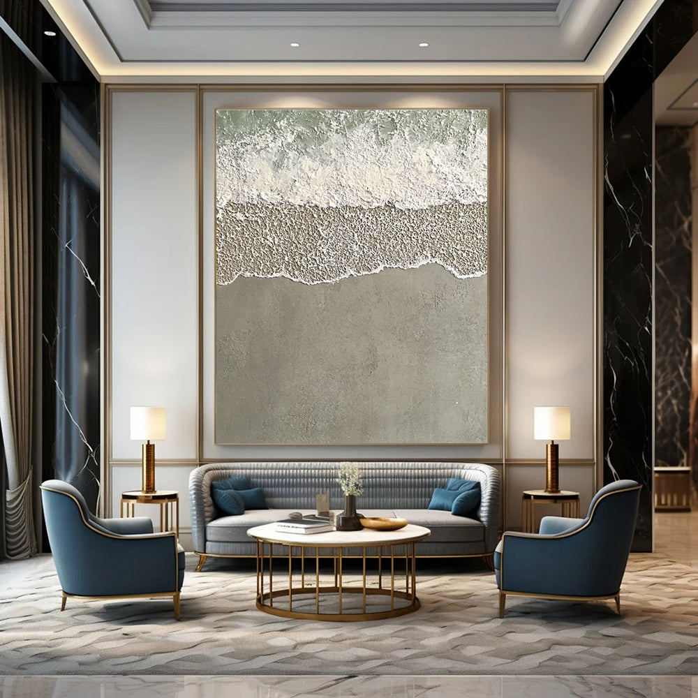 Large abstract painting depicting serene water and sand with textured wave patterns in light green and grayish-white tones.STSC1136