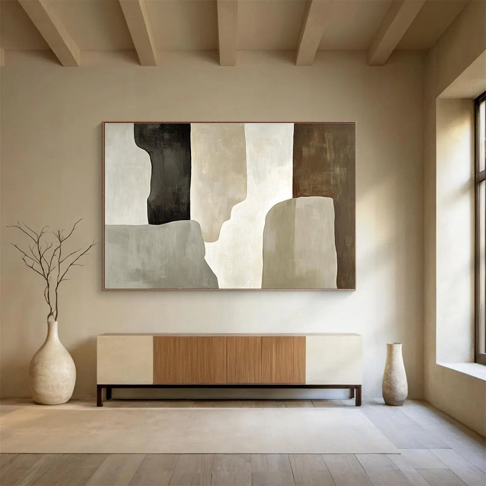 Large abstract painting featuring soft gray and beige tones with loose brush strokes and a prominent black shadow and tall monolithic shape.SC280