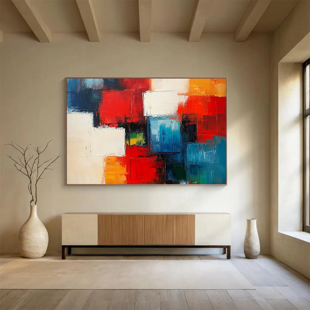 A large abstract painting of city blocks in red and blue with white squares and thick brush strokes.SC347
