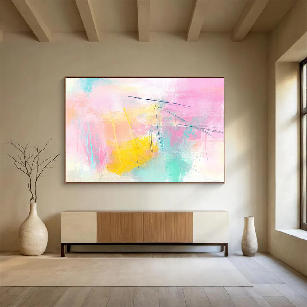 Large abstract painting featuring pink and yellow tones light blue lines and soft shapes creating a dreamy atmosphere with delicate brushstrokes and pastel background.SC211