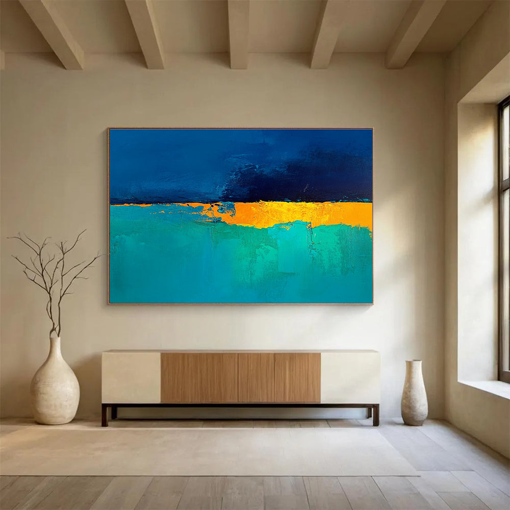 Large abstract painting in deep blue and turquoise with a golden yellow horizon perfect for enhancing modern interiors.SC524