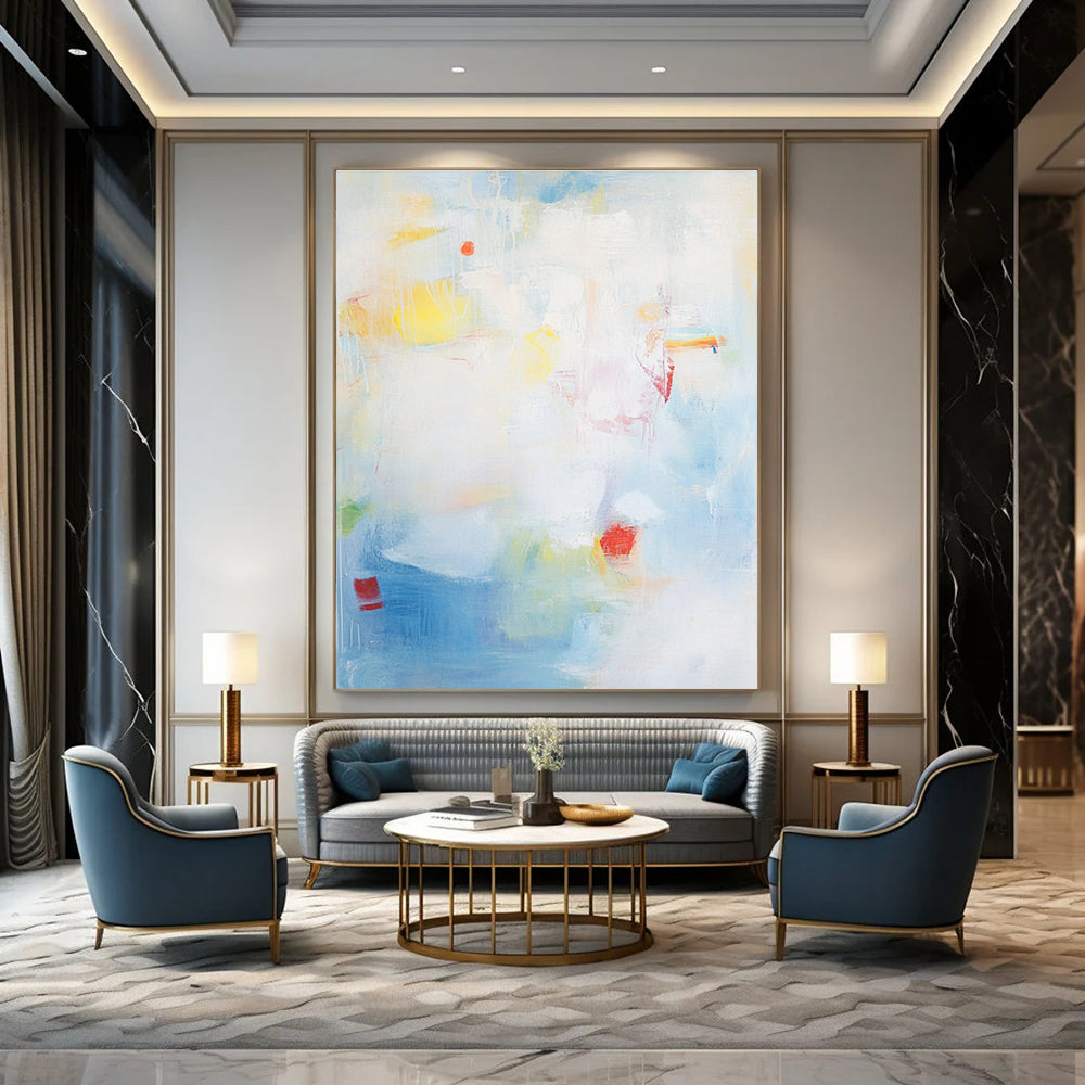 Large abstract painting with a light blue background and soft strokes depicting the sea with waves rocks and fishing boats.STSC401